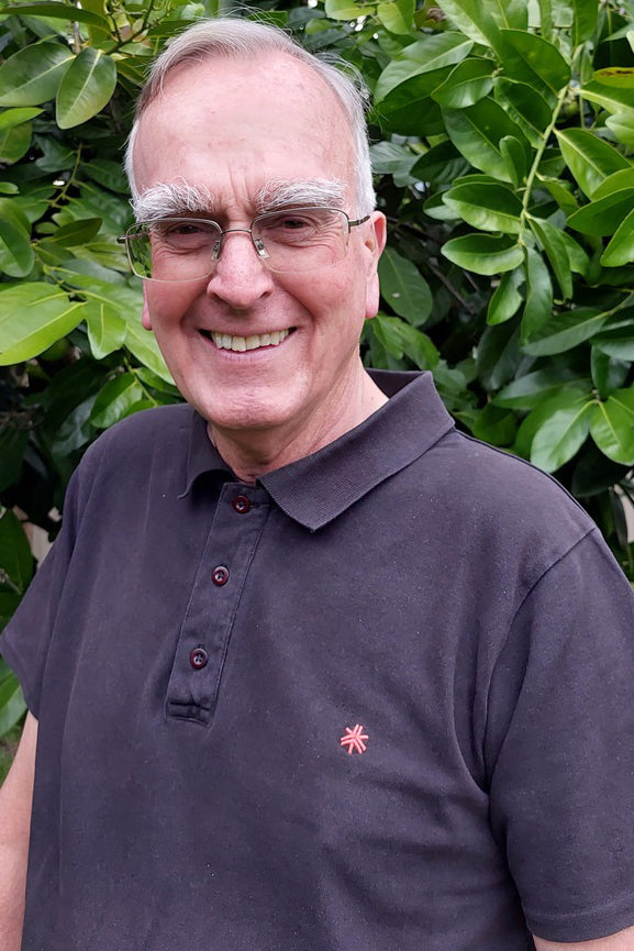 Reverend John Martin in Etiko Fairtrade Organic Cotton Unisex Black Polo Shirt 